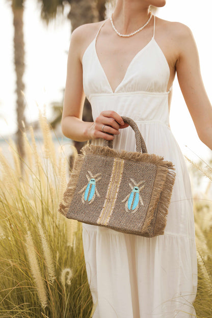 Blue and gold insects tote