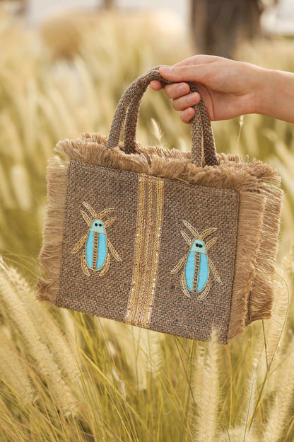 Blue and gold insects tote